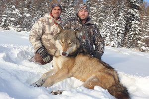 Happy wolf hunter in Alberta